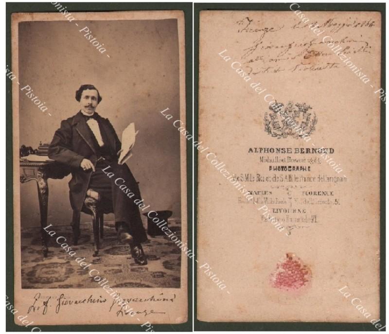 GIOVACCHINO GIOVACCHINI (1825 – 1906). Compositore e violinista italiano, intimo amico di Rossini. Foto all’albumina formato Carte da Visite dello Studio Bernoud che lo ritrae seduto. A retro dedica firmata: “Firenze lì 8 maggio 1864. Giovacchino Giovacchini all’amico Ettore Pinelli distinto violinista”.